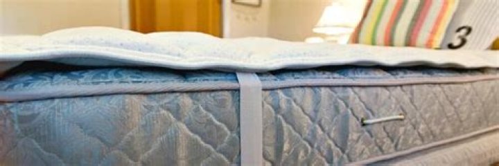 Does a mattress topper go under a mattress pad
